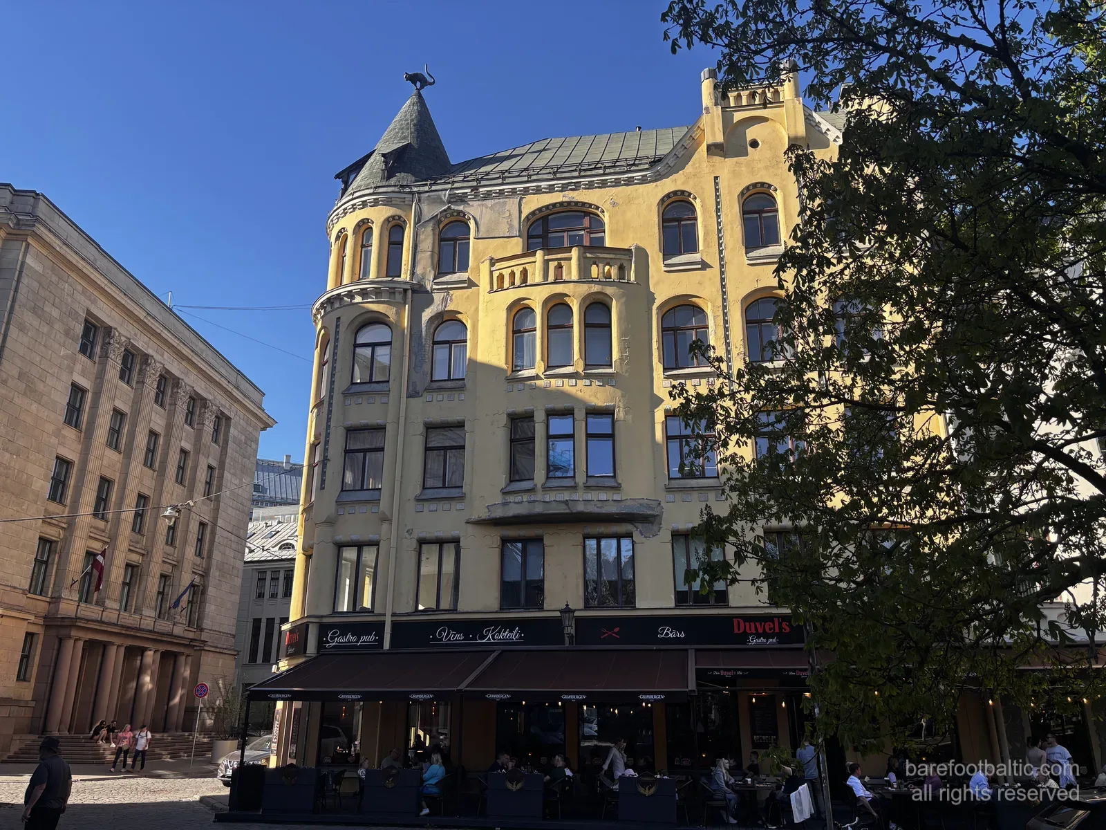 The Cat House on Meistaru iela in Riga Old Town, with the bronze cat on the corner turret, Latvia
