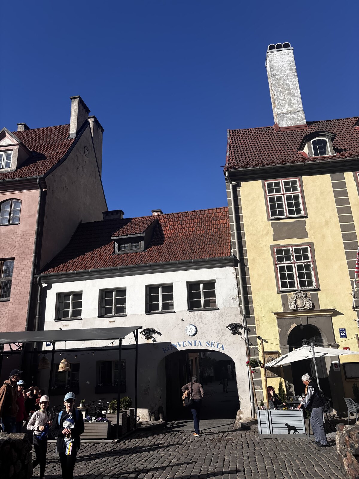 The Konventa Sēta arched entrance from Kalēju iela in Riga Old Town, Latvia
