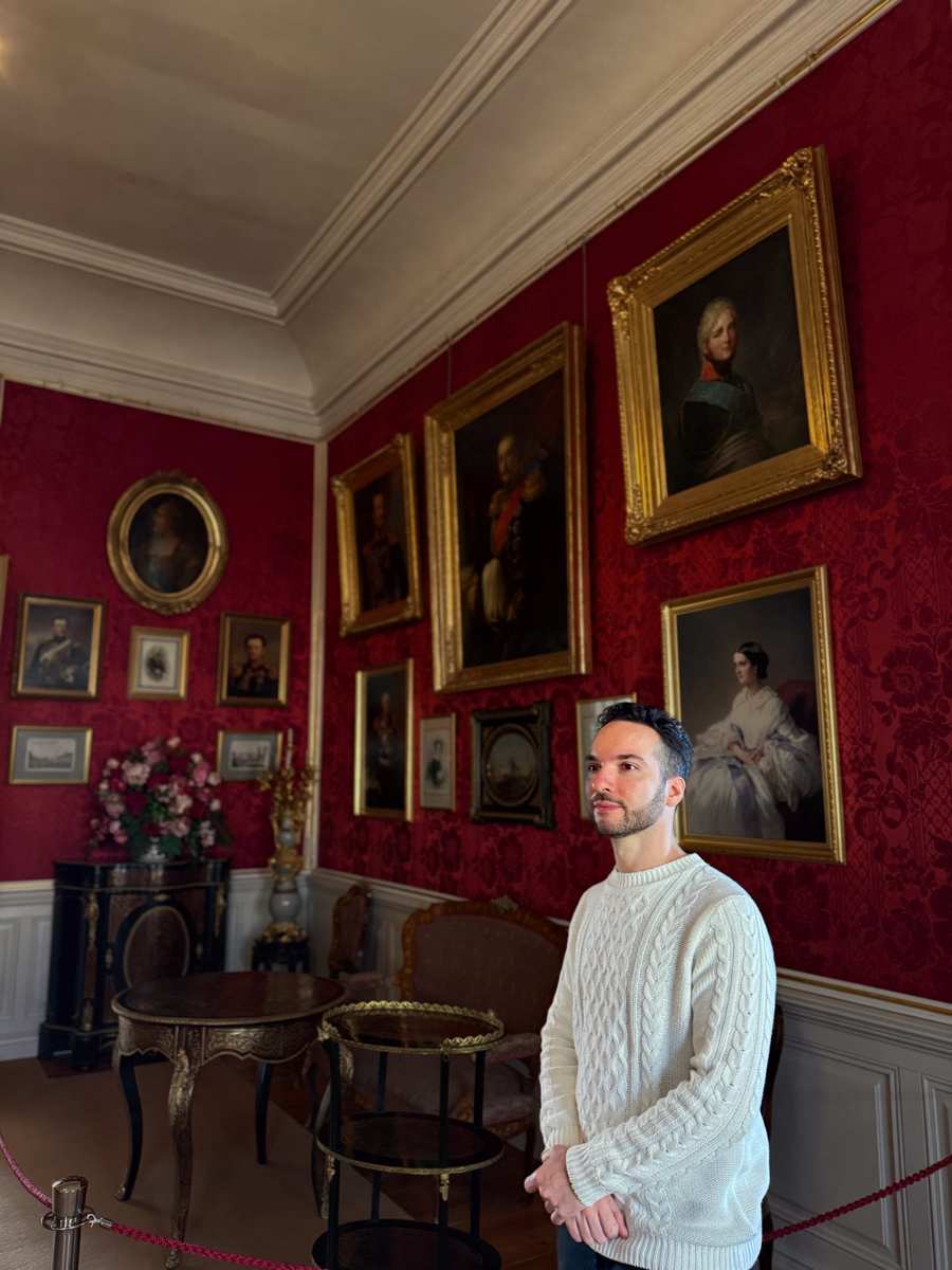 Rundāle Palace Red Room, deep crimson walls and period furniture
