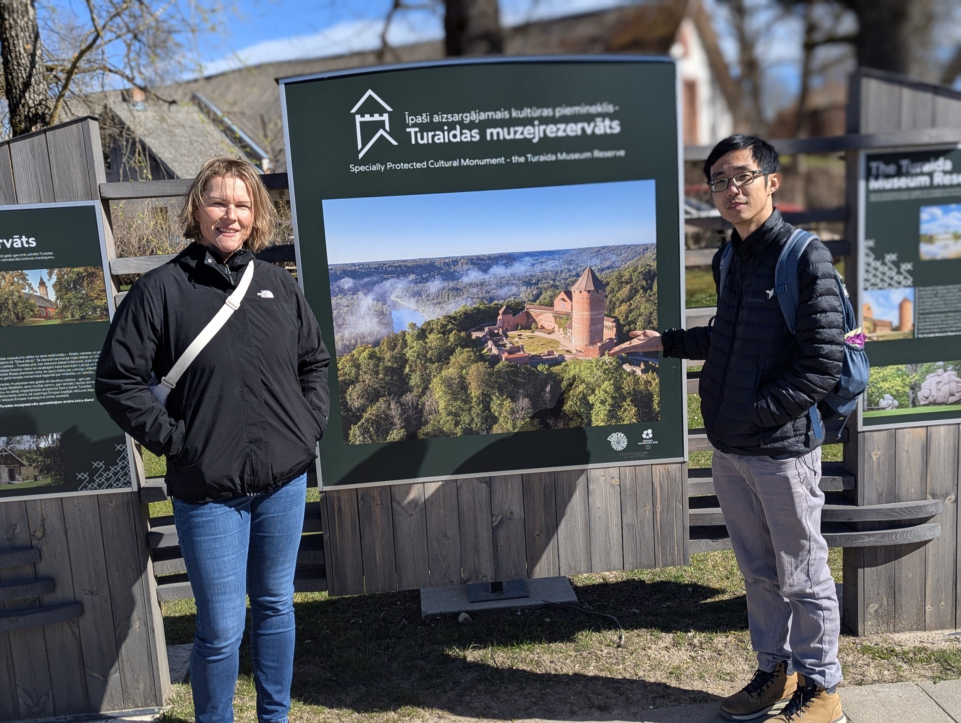 Guests at the Krimulda walking trail information display