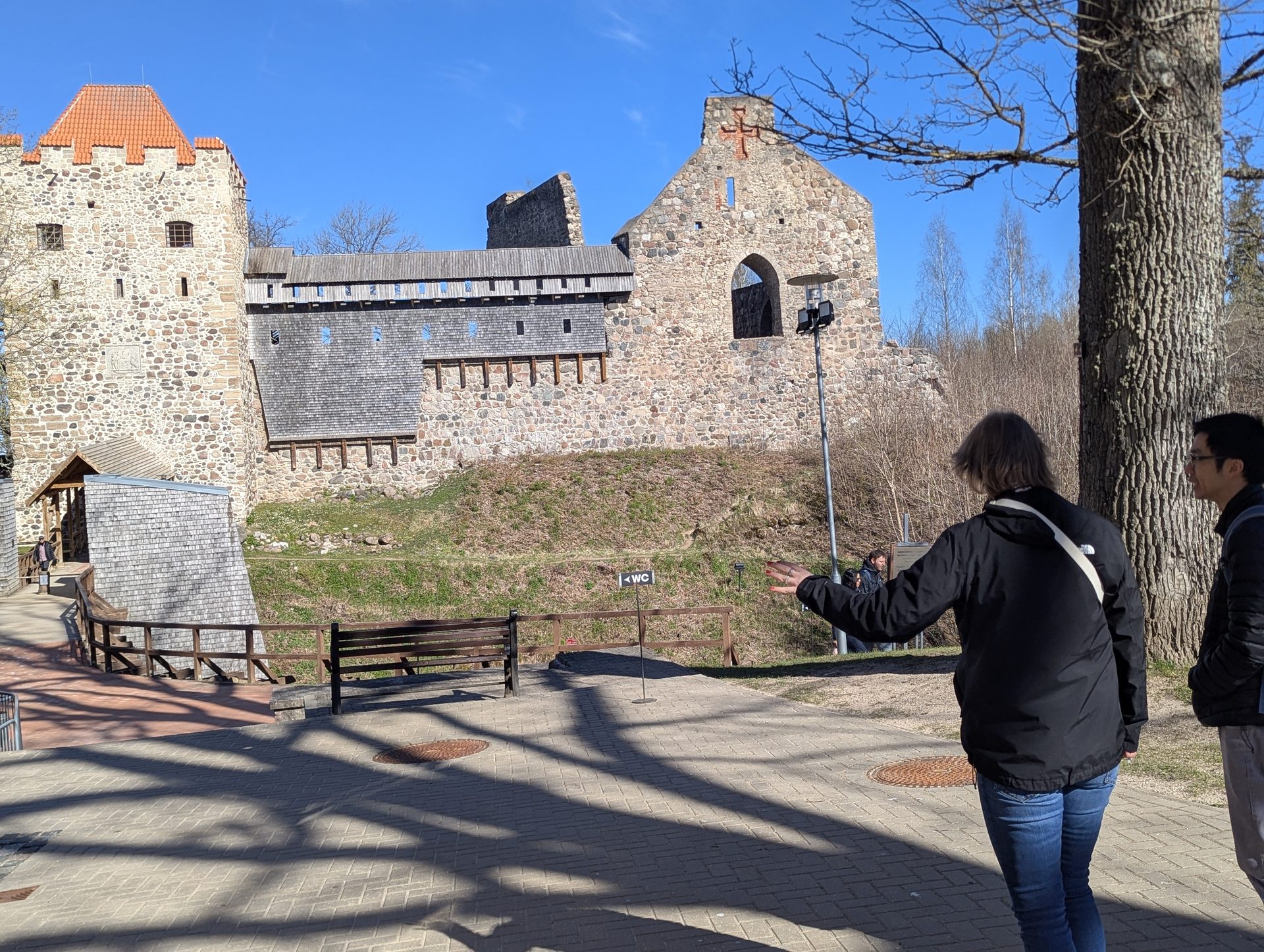 Visitors on the path to the Sigulda Medieval Castle ruins
