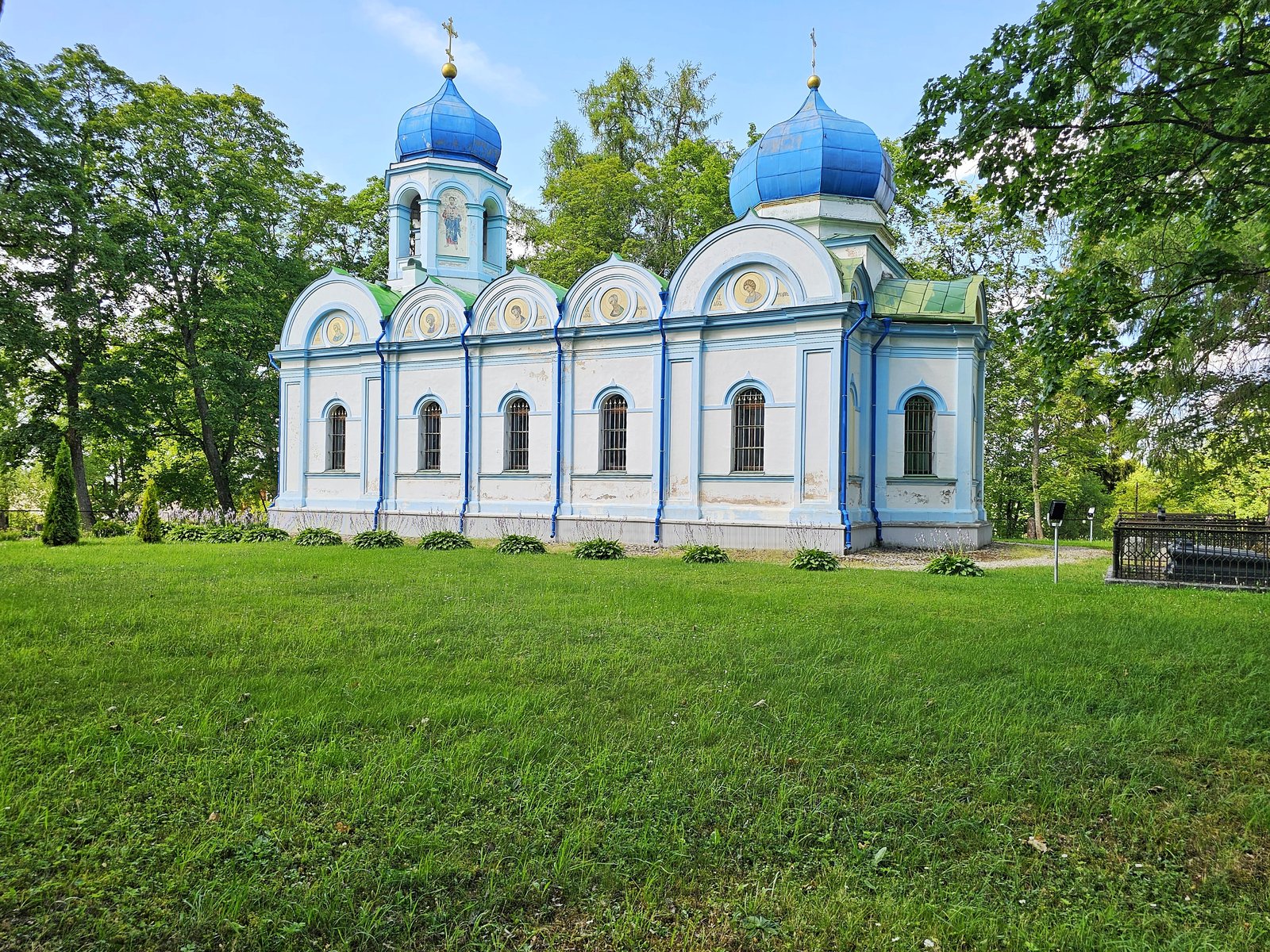 A blue-domed orthodox church in the Vidzeme countryside