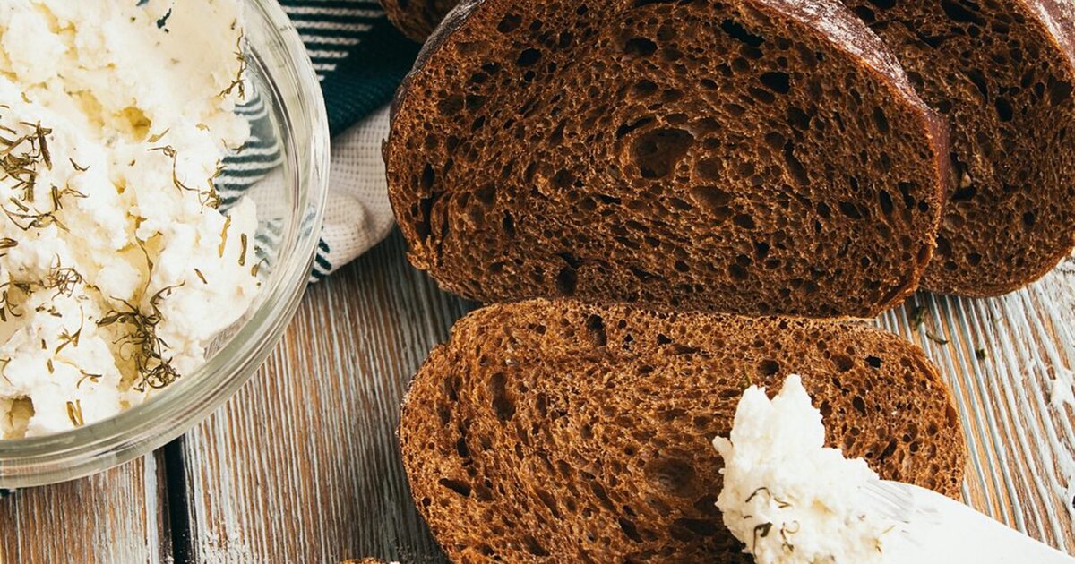 Latvian rupjmaize (rye bread) with biezpiens (cottage cheese) — staples of the Latvian table.