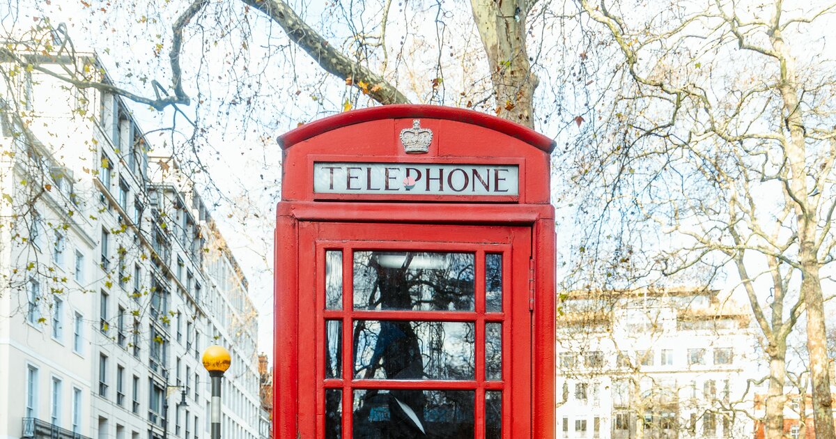 A classic London red telephone box — for a Latvian guide's briefing for British travellers heading to Riga.